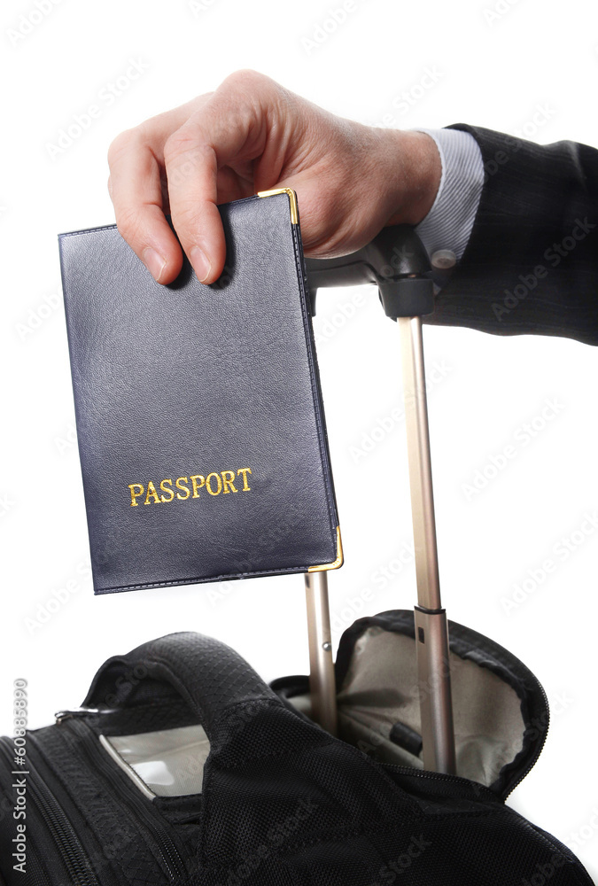 Fototapeta business man hand close up holding passport