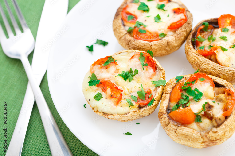 Mushrooms stuffed with mozzarella and tomato Mushrooms stuffed with mozzarella and tomato