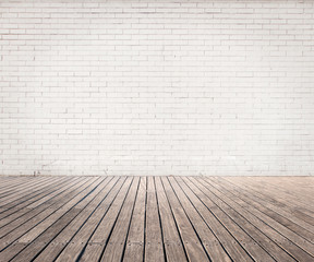 white bricks wall and wood floor