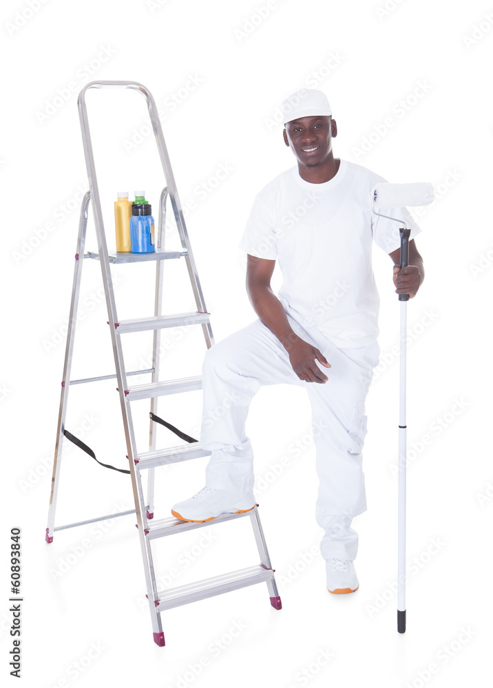 Young African Painter With Roller Young African Painter With Roller