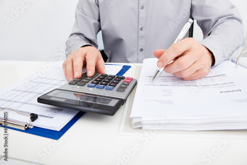 Man Calculating Bills