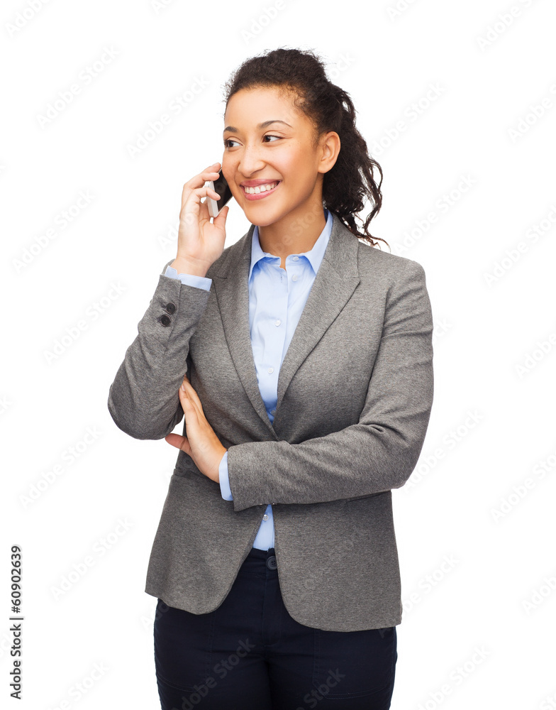 smiling woman looking at smartphone smiling woman looking at smartphone