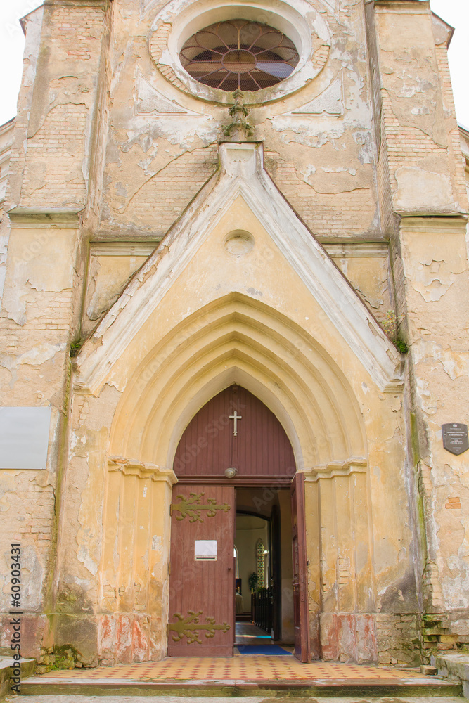 Old opened vintage door in church