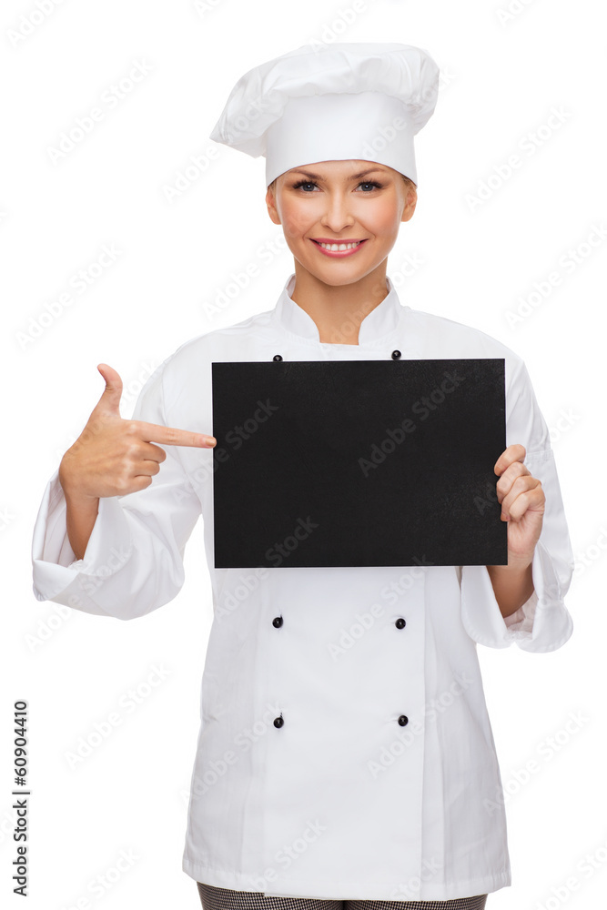 smiling female chef with black blank paper smiling female chef with black blank paper