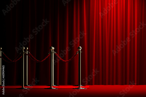 Rope barrier with red carpet and curtain © dampoint