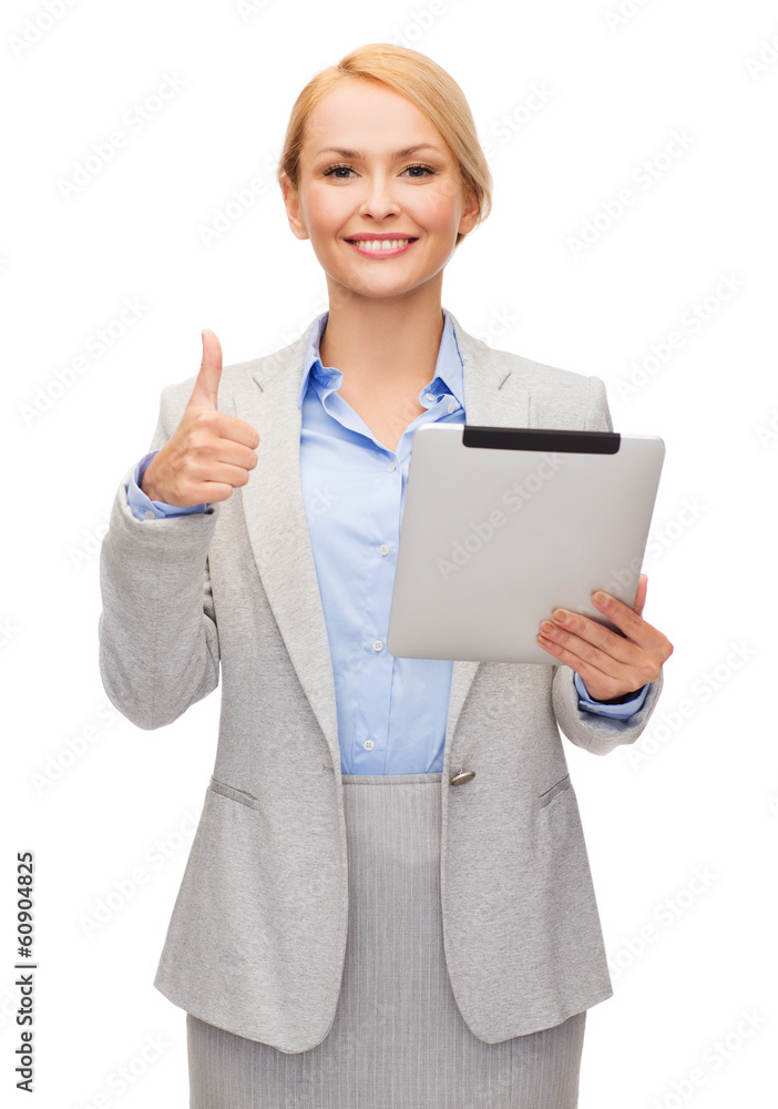 smiling woman with tablet pc showing thumbs up smiling woman with tablet pc showing thumbs up