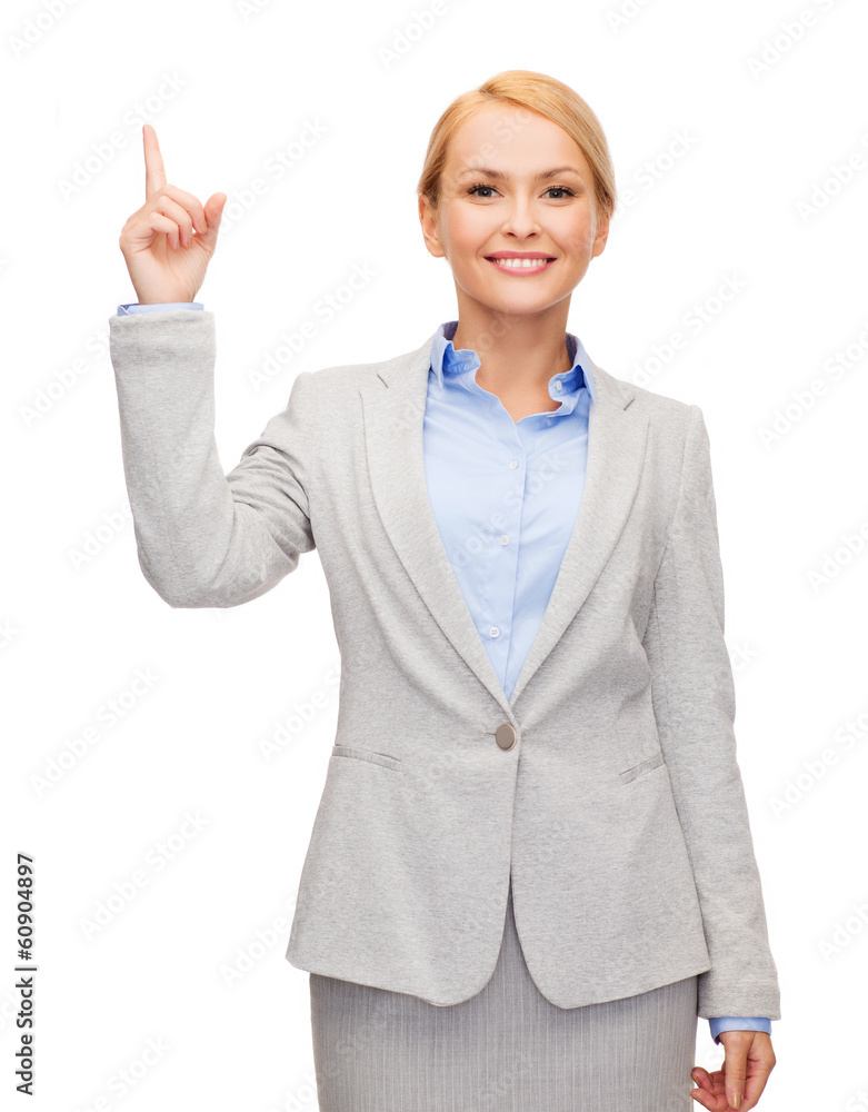 smiling businesswoman with her finger up smiling businesswoman with her finger up