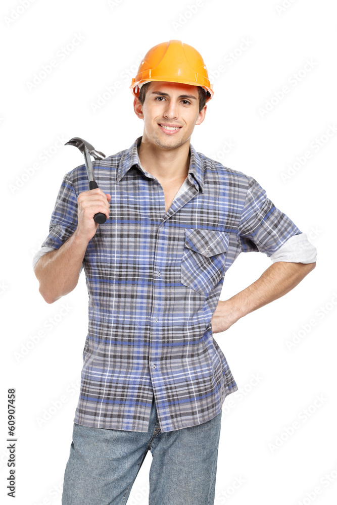 Half-length portrait of foreman in range hard hat handing hammer Half-length portrait of foreman in range hard hat handing hammer
