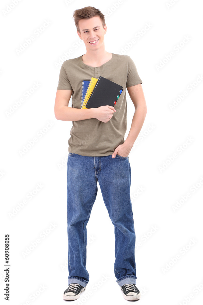 Handsome young man with notebooks, isolated on white Handsome young man with notebooks, isolated on white