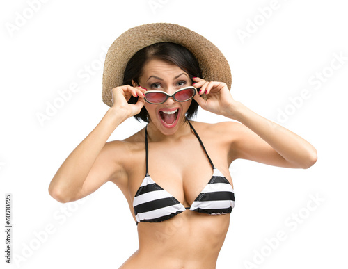 Half-length portrait of woman wearing bikini