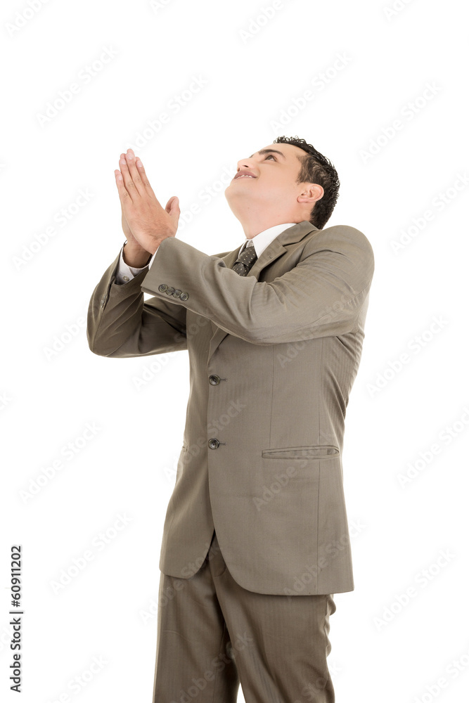 Portrait of a hispanic praying businessman Portrait of a hispanic praying businessman