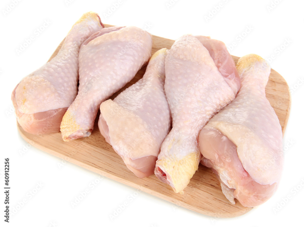 Raw chicken legs isolated on white Raw chicken legs isolated on white