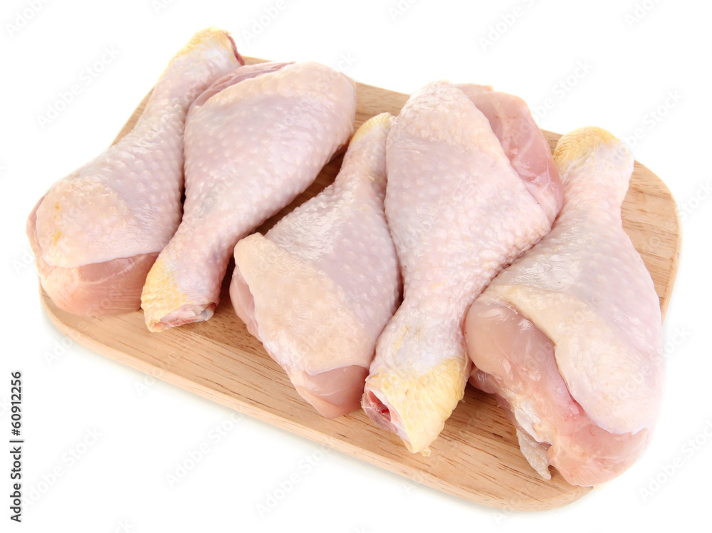 Raw chicken legs isolated on white