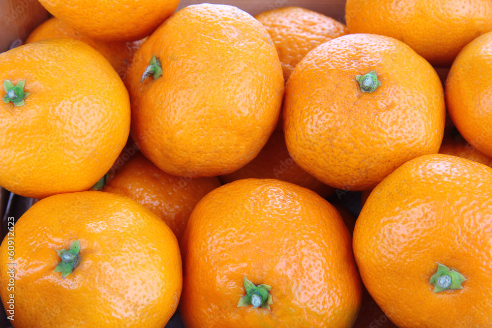 Ripe sweet tangerines background Ripe sweet tangerines background