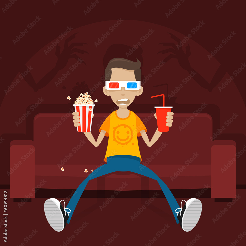 Naklejka premium Teenager sits on sofa in 3D glasses