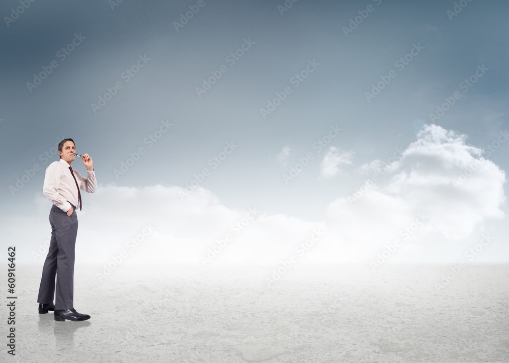 Composite image of thinking businessman holding glasses Composite image of thinking businessman holding glasses