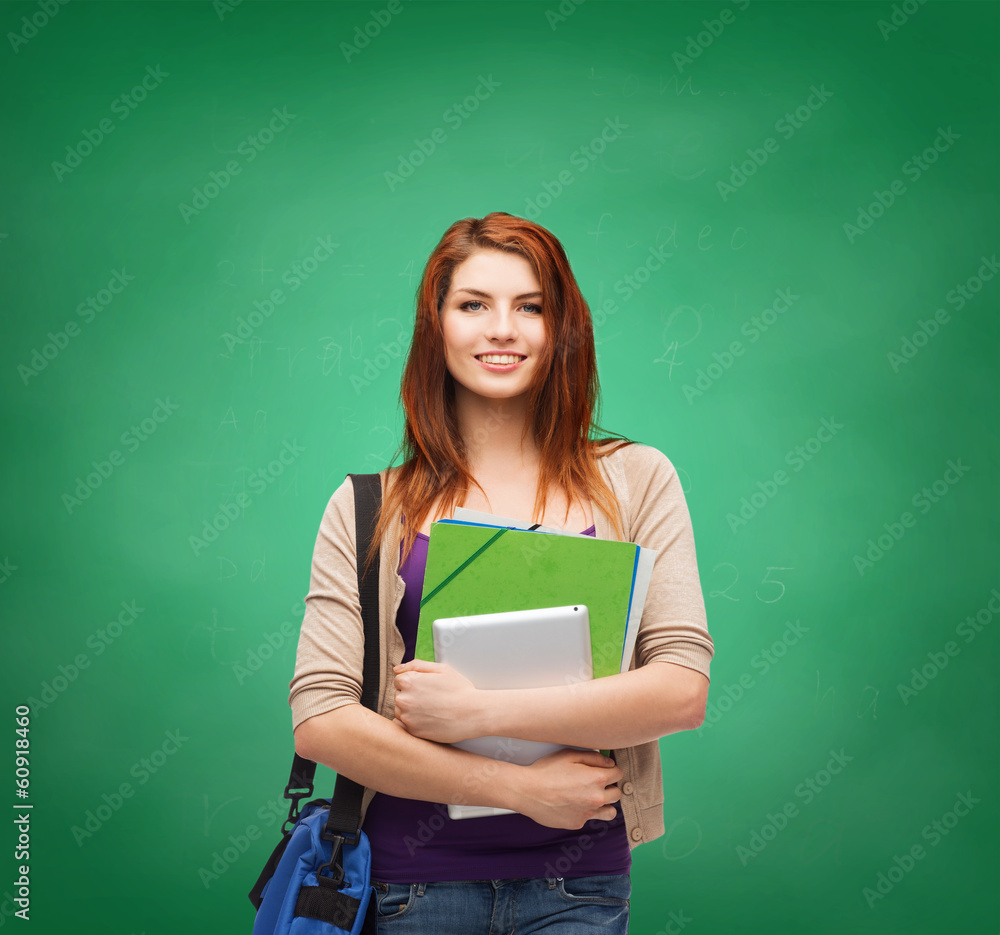 smiling student with bag, folders and tablet pc smiling student with bag, folders and tablet pc
