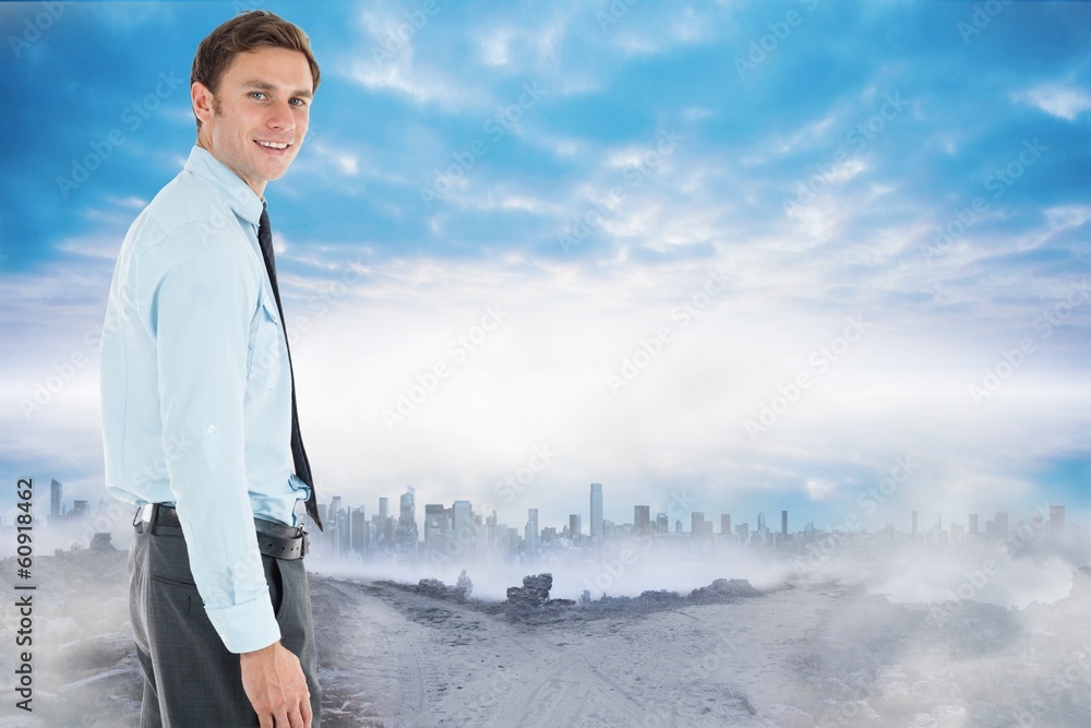 Composite image of happy businessman standing with hand in pocke Composite image of happy businessman standing with hand in pocke