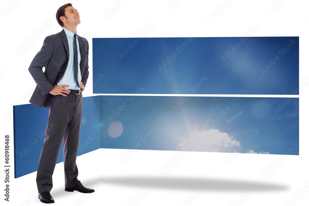 Composite image of smiling businessman with hands on hips Composite image of smiling businessman with hands on hips