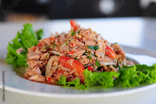 Thai spicy tuna salad with onion and tomato