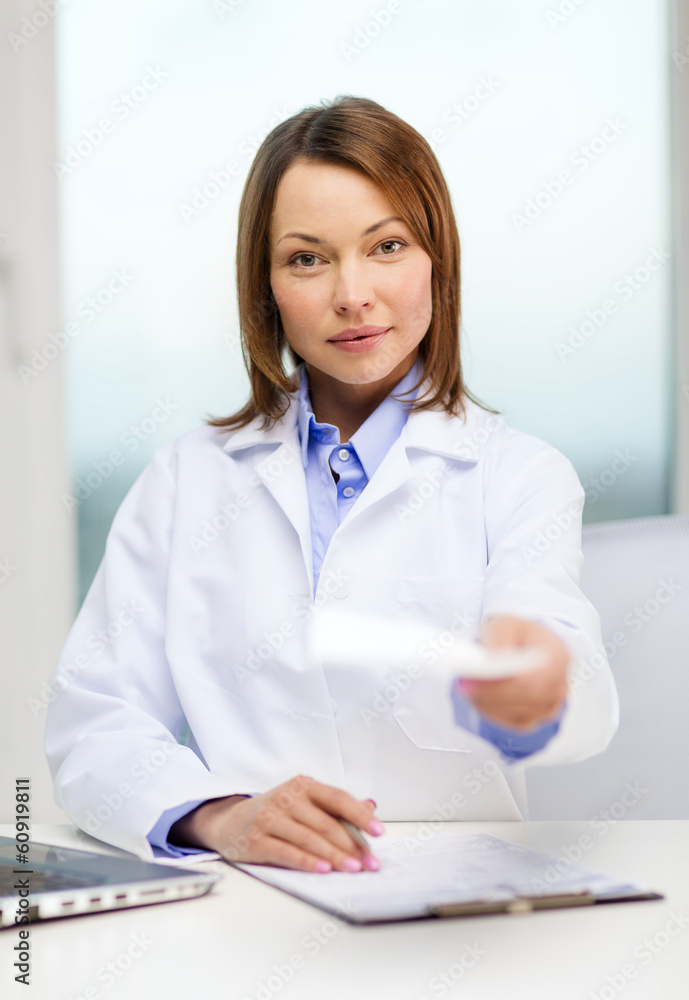 busy doctor with laptop computer and clipboard busy doctor with laptop computer and clipboard