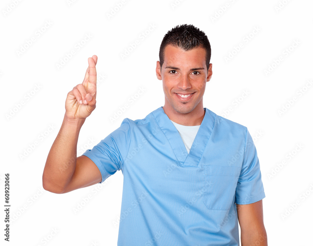 Handsome male nurse with luck sign Handsome male nurse with luck sign