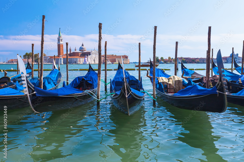 Gondolas at pier. Venice. Italy.