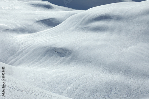 Snowy slope in the mountains