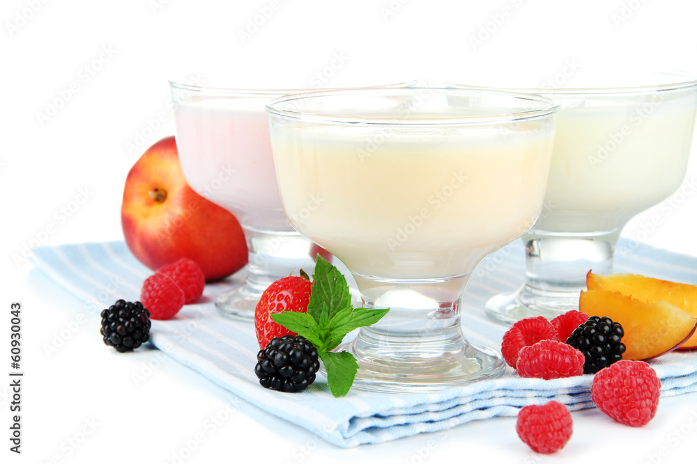 Delicious yogurt with fruit and berries isolated on white Delicious yogurt with fruit and berries isolated on white