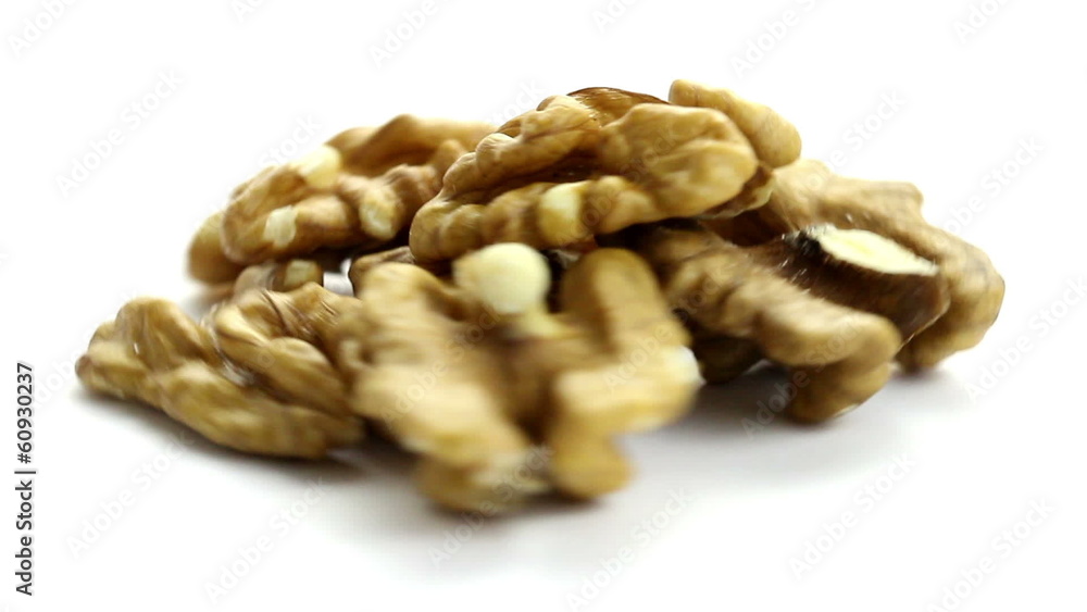Nuts rotating fast, studio shot on white background Nuts rotating fast, studio shot on white background