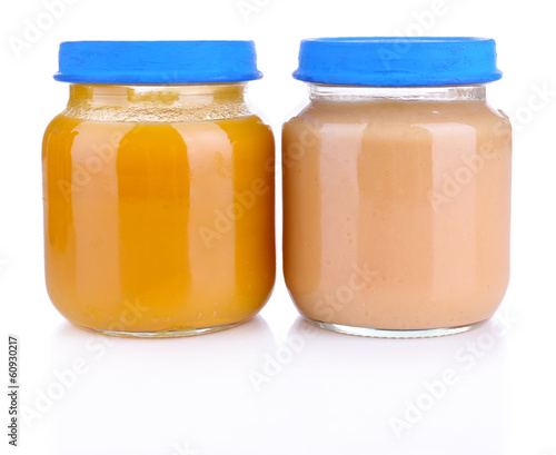 Baby food in glass jars, isolated on white