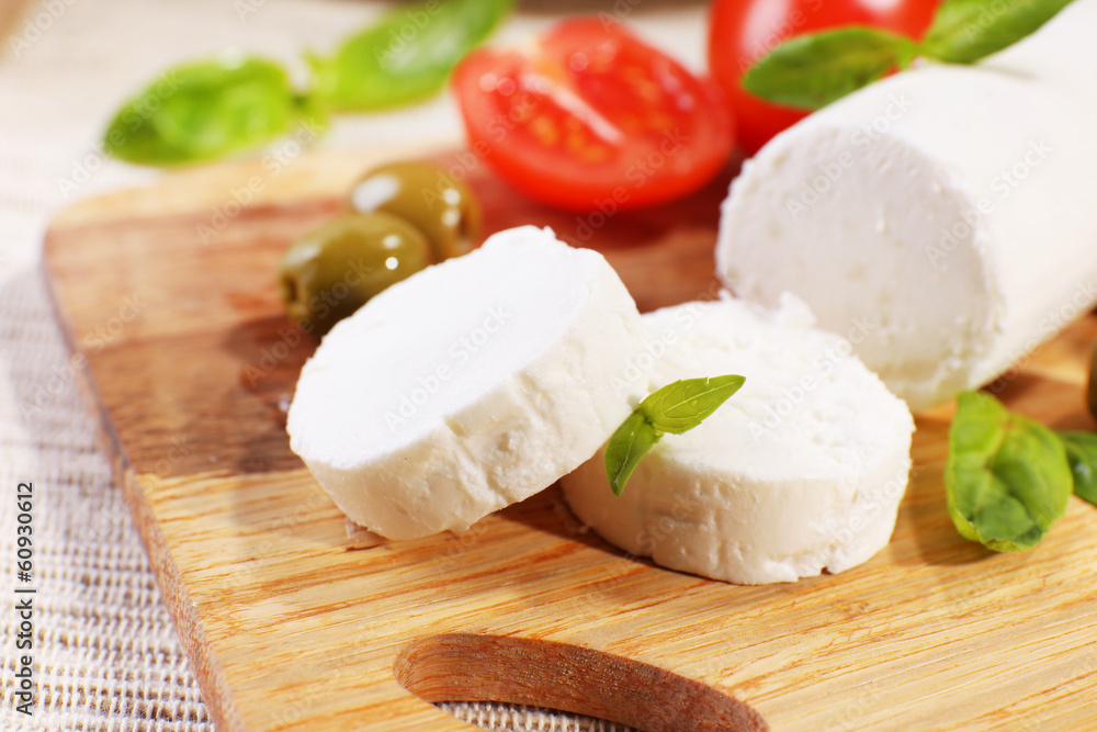 Tasty bushe cheese with tomatoes, olives and basil, Tasty bushe cheese with tomatoes, olives and basil,
