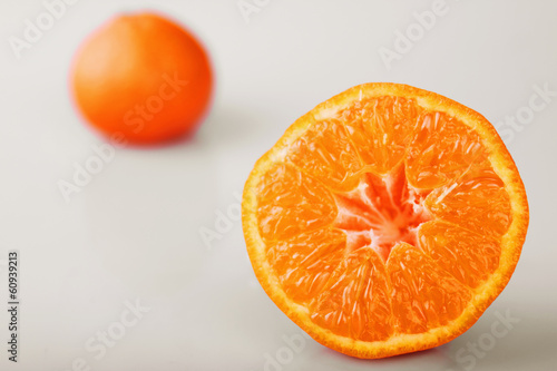 peeled orange on the white background
