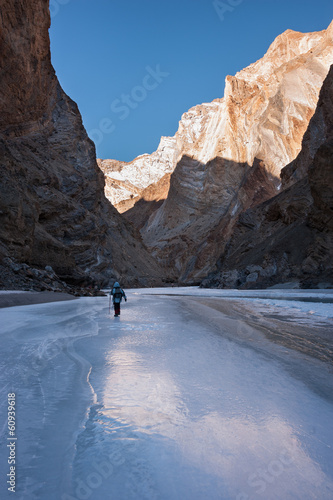 Winter trekking on the frozen Zanskar River in Ladakh. photo