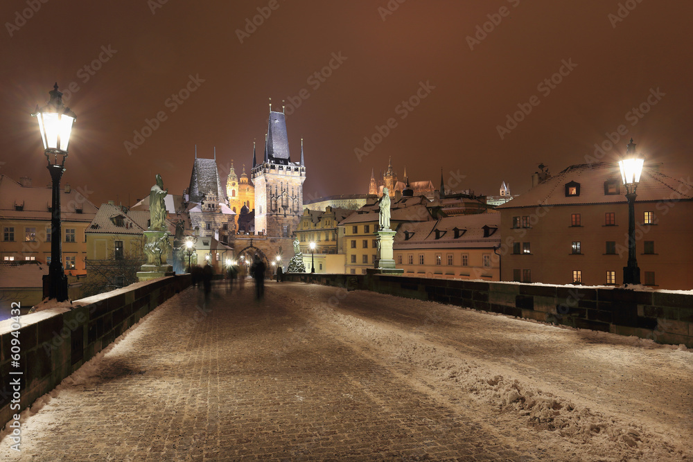 Night snowy Prague gothic Castle and St. Nicholas' Cathedral Night snowy Prague gothic Castle and St. Nicholas' Cathedral