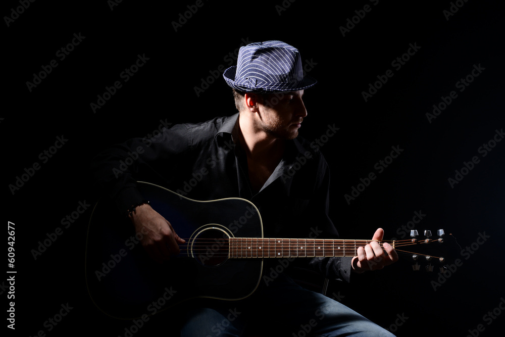 Young musician playing acoustic guitar and singing, Young musician playing acoustic guitar and singing,