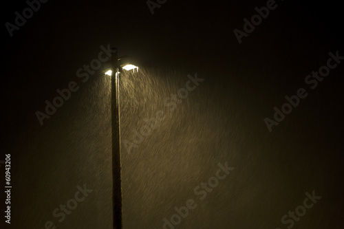 lamp post in snowstorm