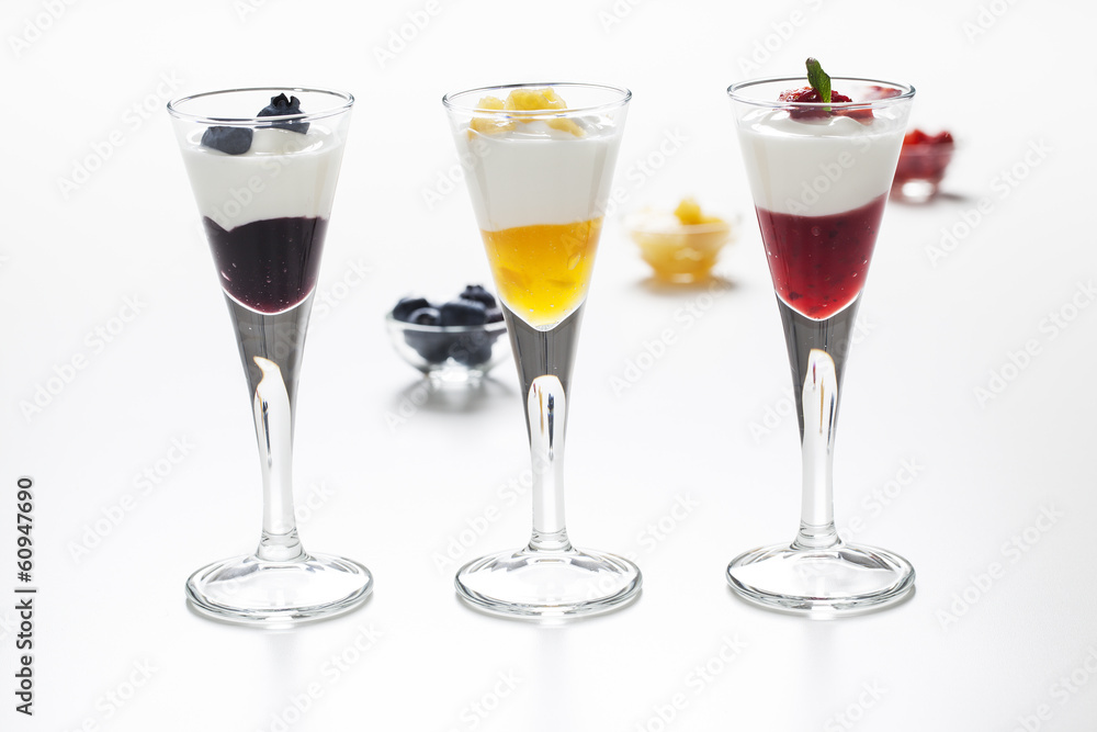 Still life of yogurt, berries, peach and jam Still life of yogurt, berries, peach and jam