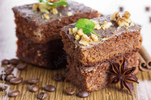 Slice of chocolate cake with nuts. Small Depth of Field (DOF)