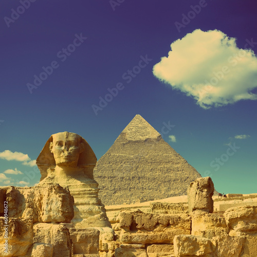Cheops pyramid and sphinx in Egypt  - vintage retro style #60948672