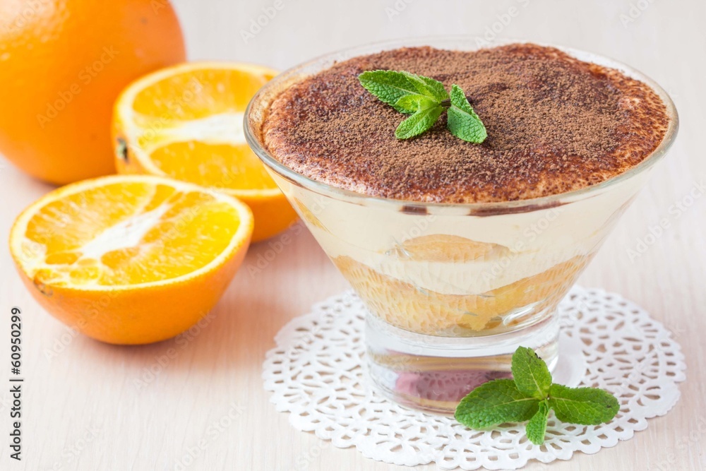 Orange tiramisu with mint, mascarpone cheese, savoyardi biscuit Orange tiramisu with mint, mascarpone cheese, savoyardi biscuit