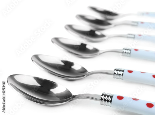 Silver spoons isolated on white