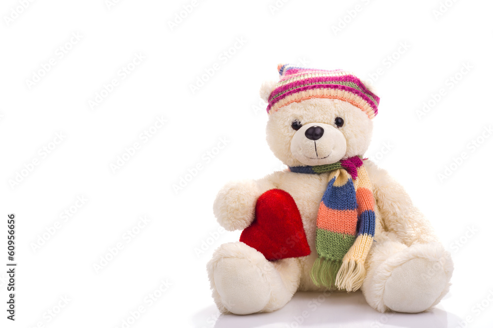 Toy teddy bear sitting with valentine heart Toy teddy bear sitting with valentine heart