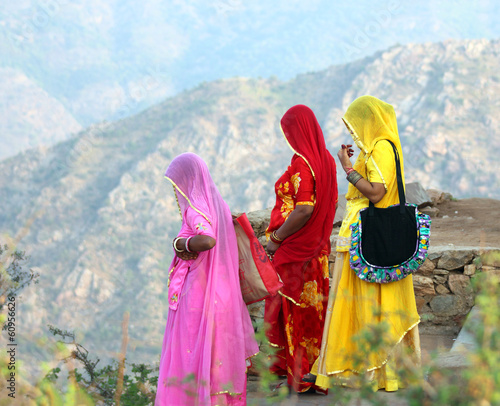 Indian women in colorful saris on top of hill