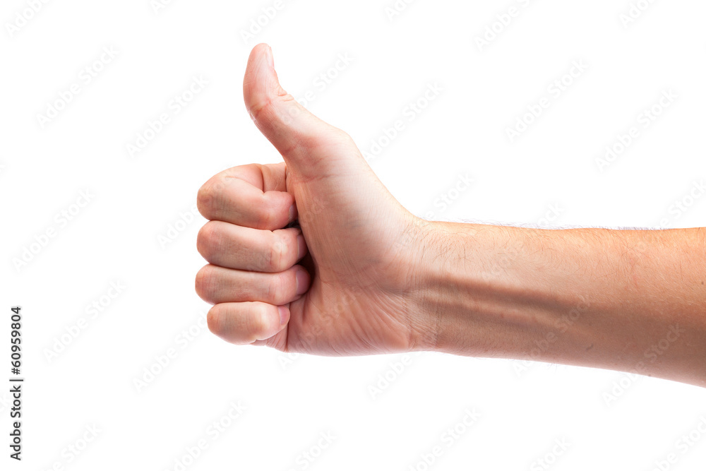 Male hand showing thumbs up sign isolated on white Male hand showing thumbs up sign isolated on white