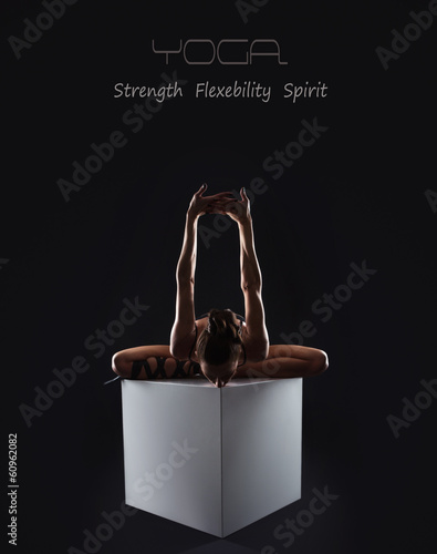 Fototapeta Naklejka Na Ścianę i Meble -  Yoga background with slim flexible girl