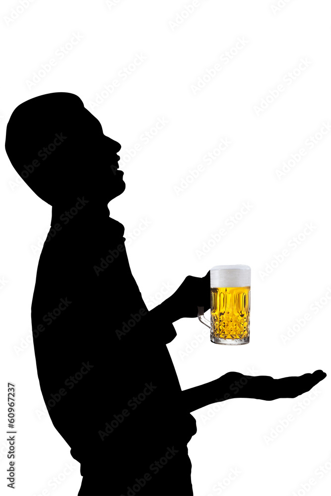 A man drinking a glass of beer