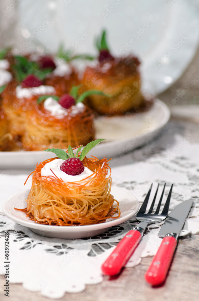 Easter dessert with raspberries and whipped cream Easter dessert with raspberries and whipped cream