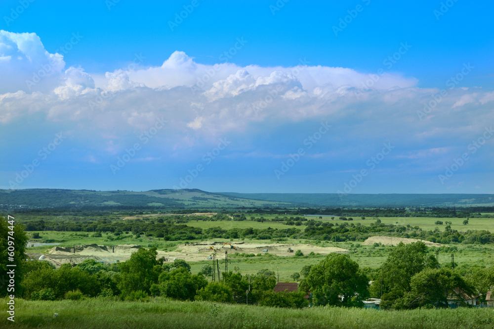 Rural landscape with clouds