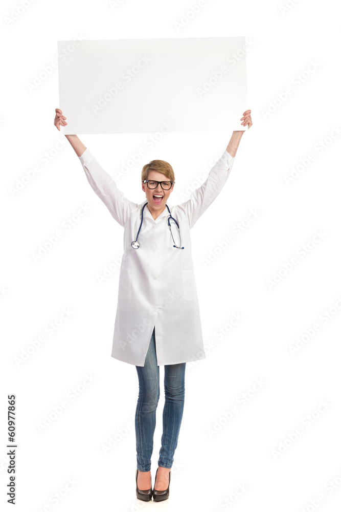 Female doctor holding banner abover her head. Female doctor holding banner abover her head.